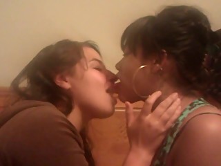 Girls Making Out On A Bed